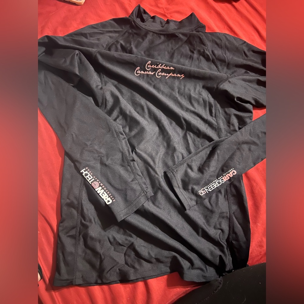 Rash guard (women’s) Caribbean Canvas Company.
